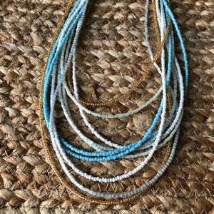 Beautiful beaded multi strand round necklace